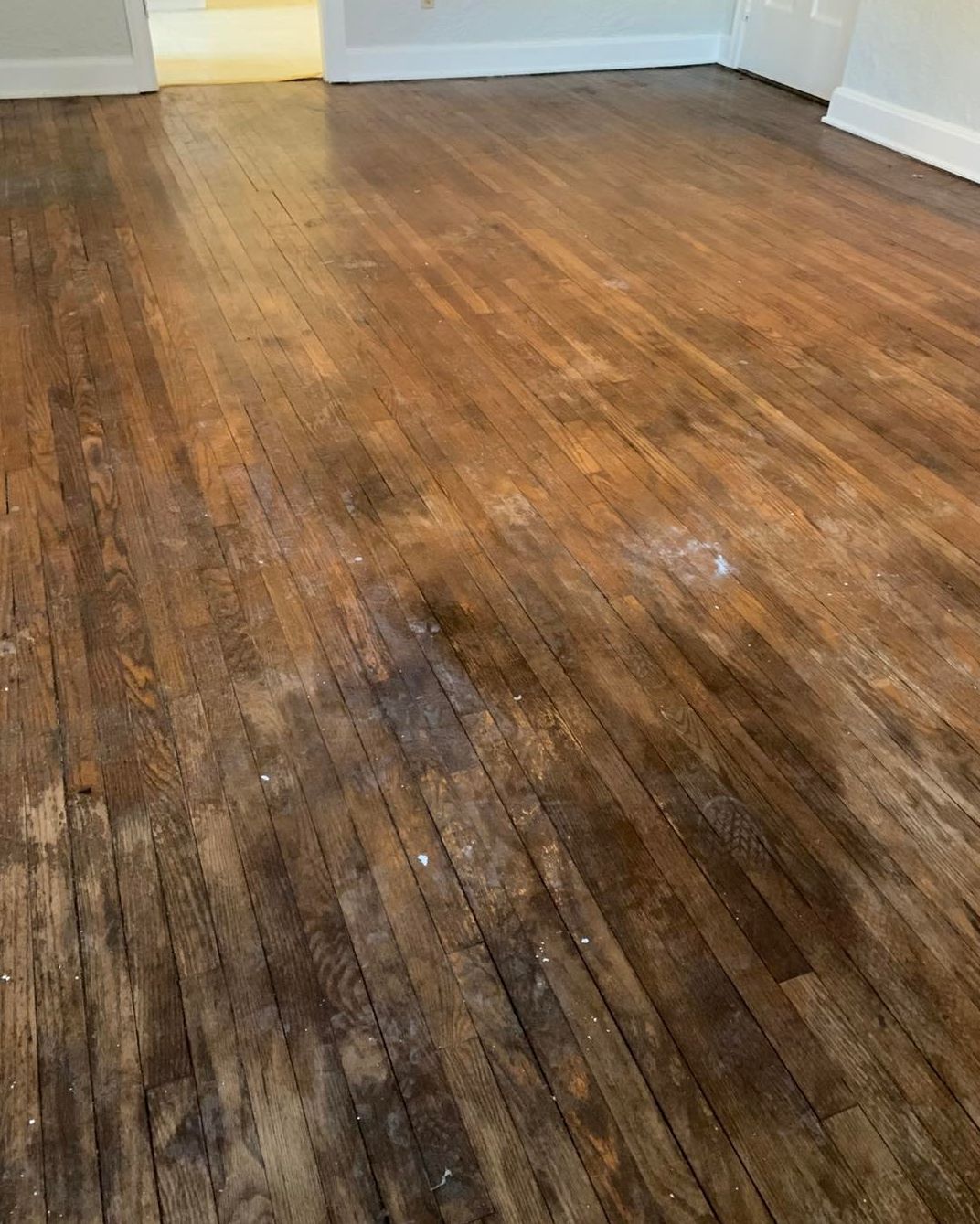 Bedroom floor before refinishing